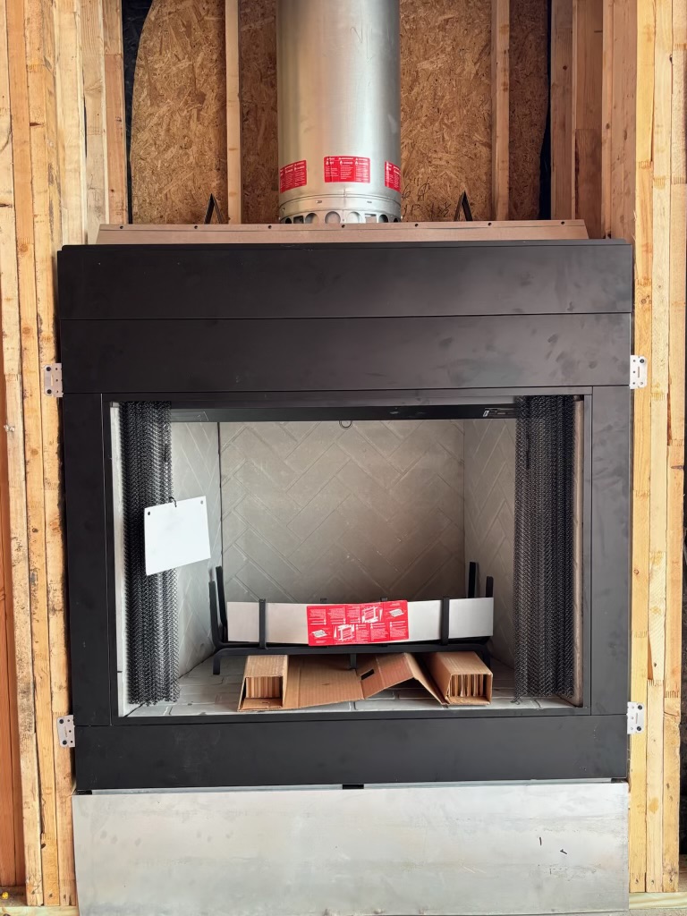 Interior fireplace framing with firebox and venting